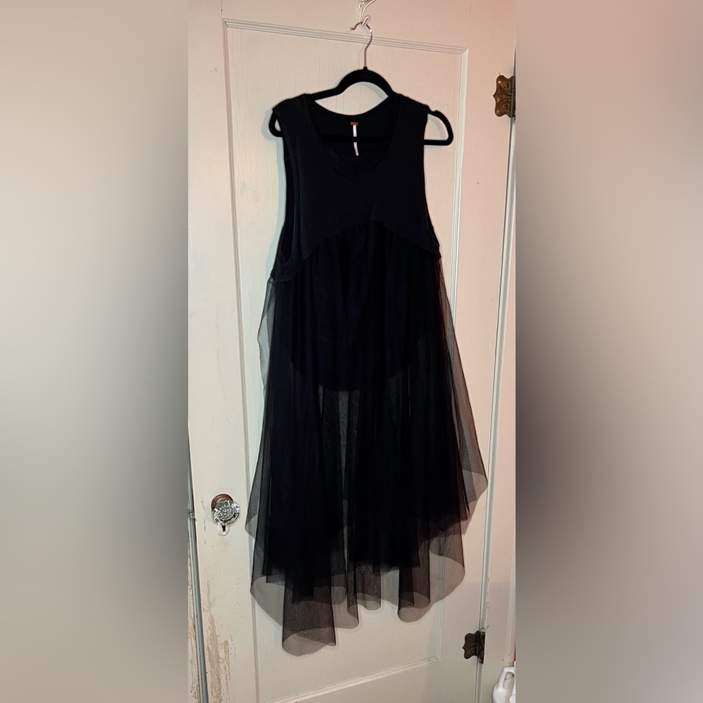 Free People size L midi “dress” black. See through bottom. Worn 1 time